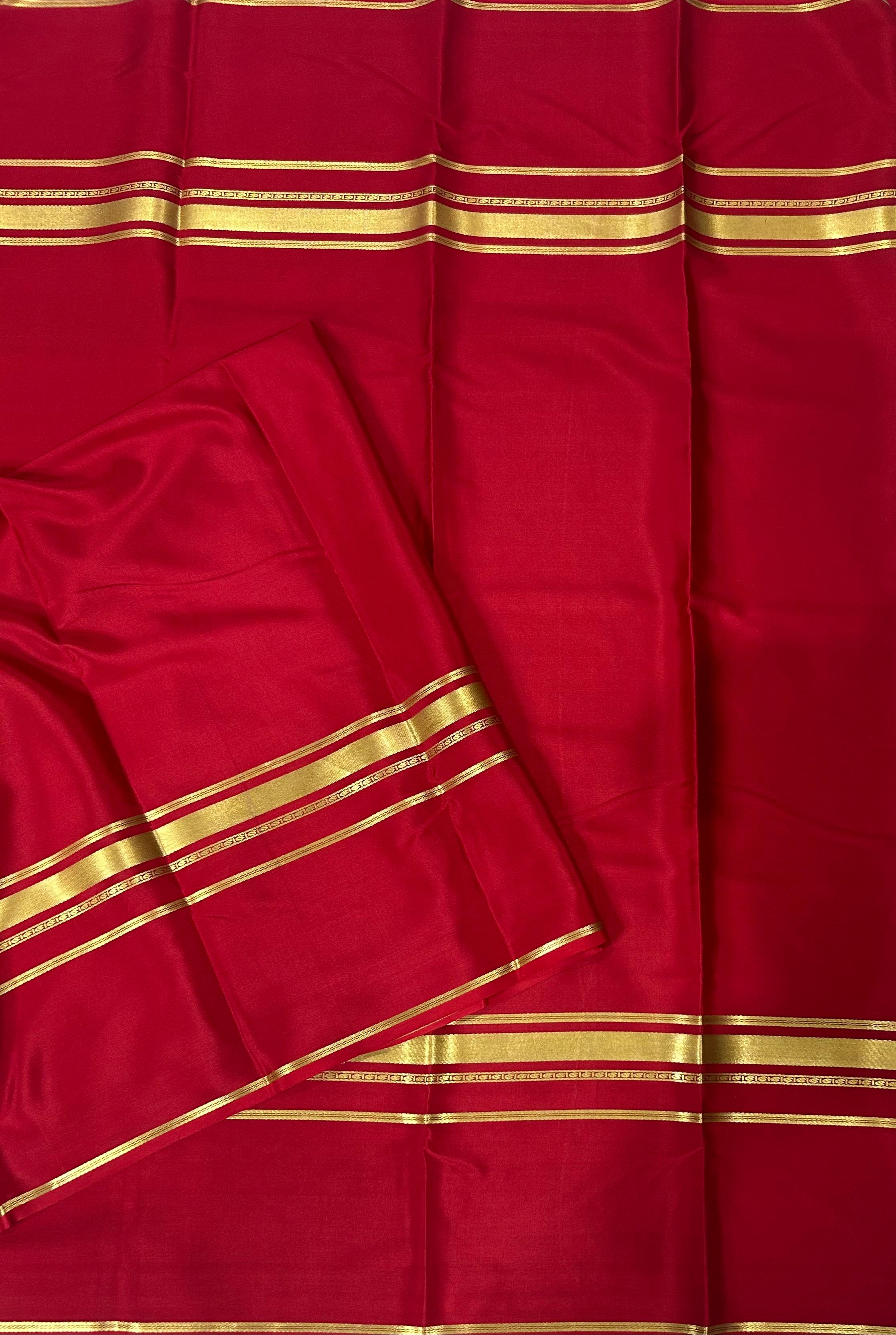 Red plain four border pure mysore crepe silk saree