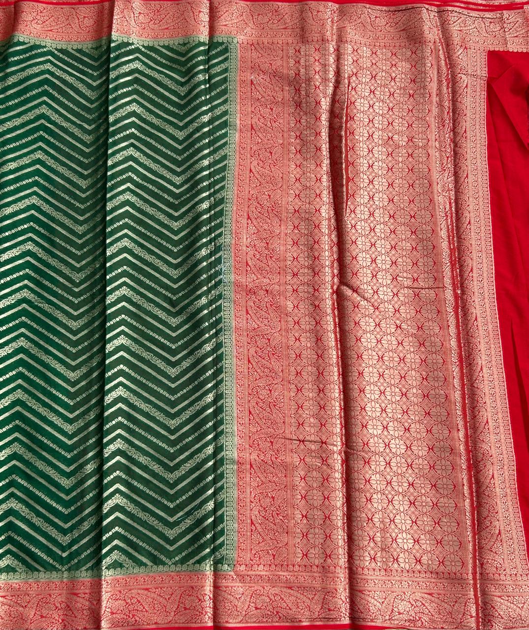 Bottle green n red semi georgette saree