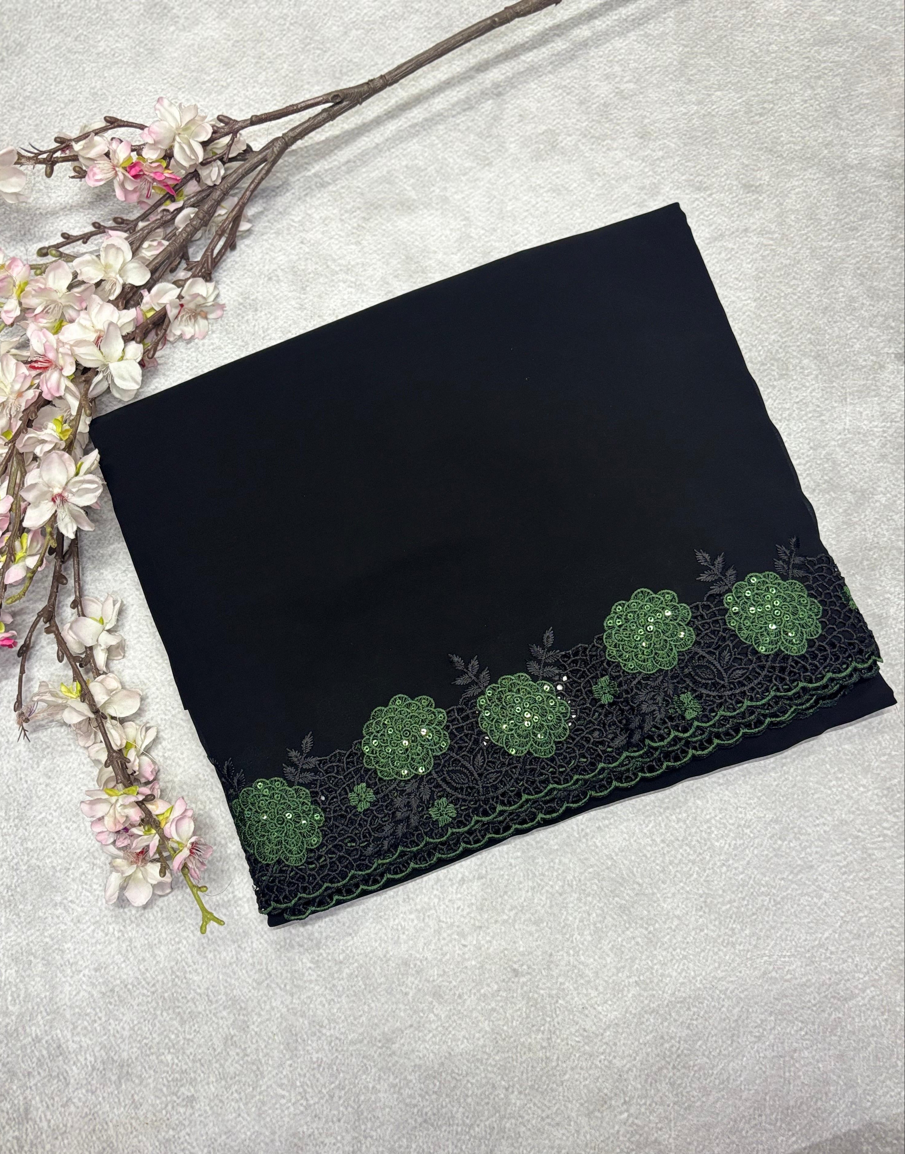 Black with mehandi green cut work border embroidery georgette