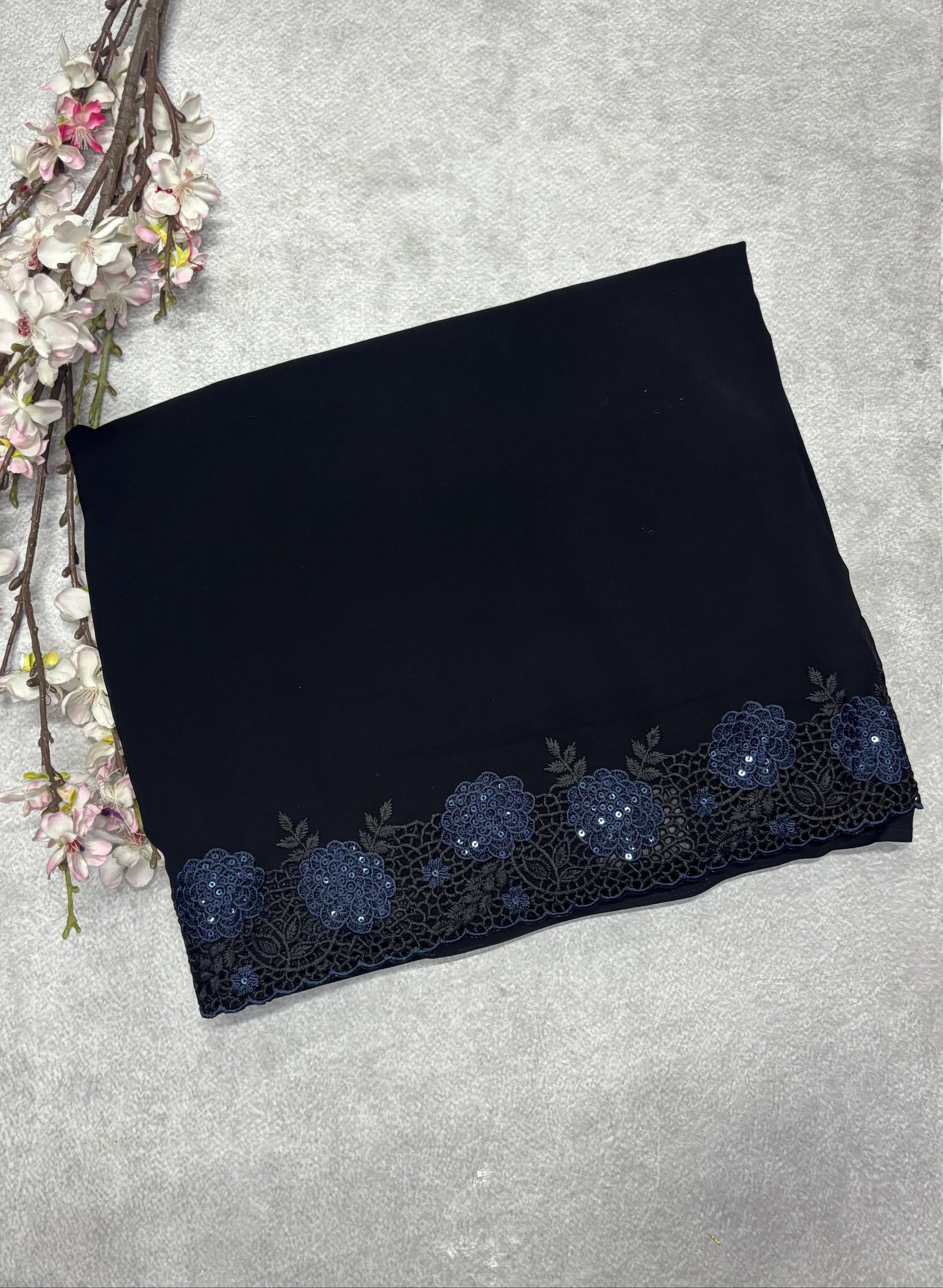 Black with blue cut work border embroidery georgette
