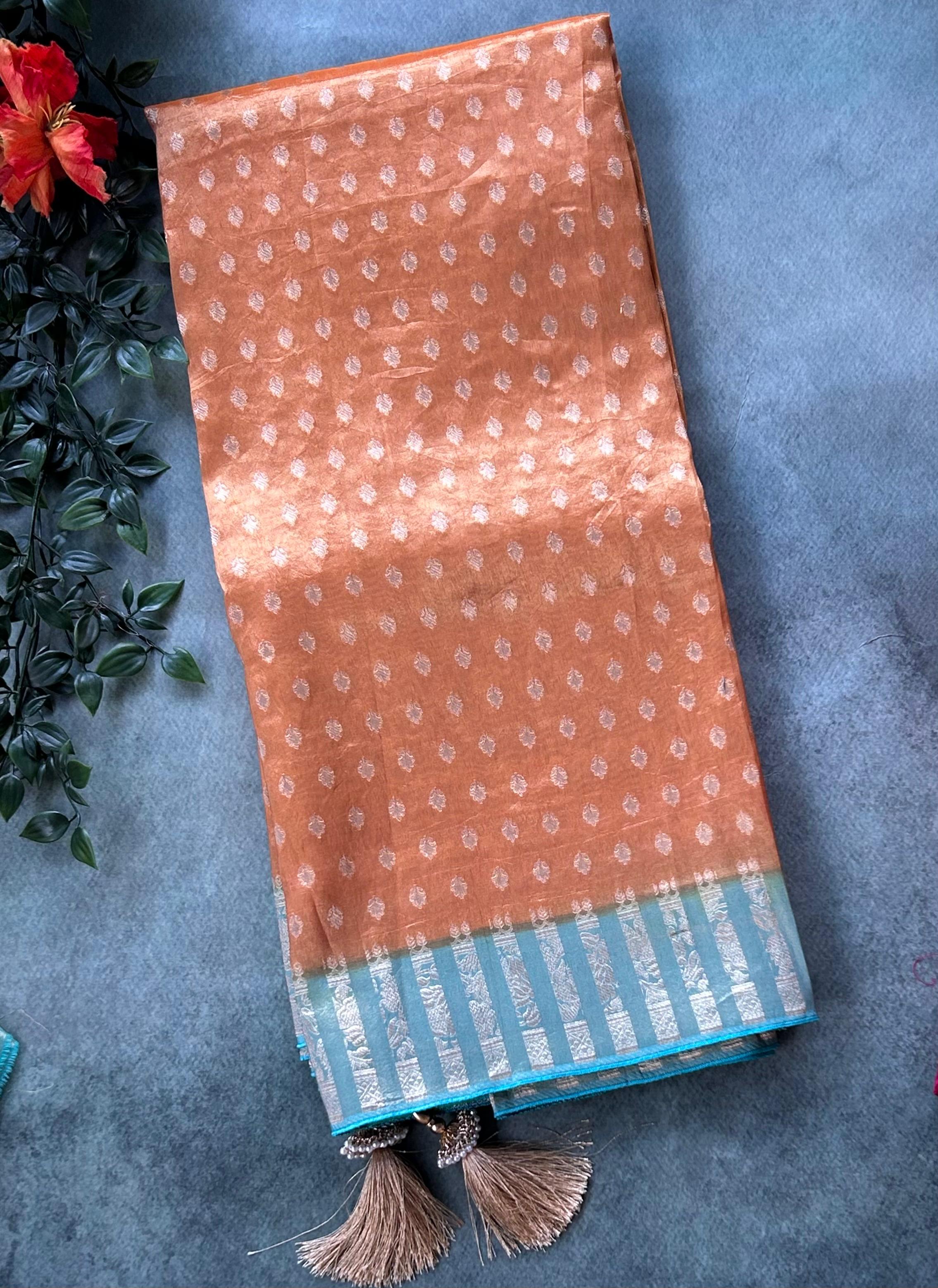 Rust orange brocade semi tissue saree