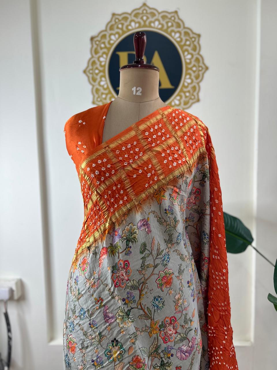 Grey n orange printed pure gajji silk with bandhini blouse saree