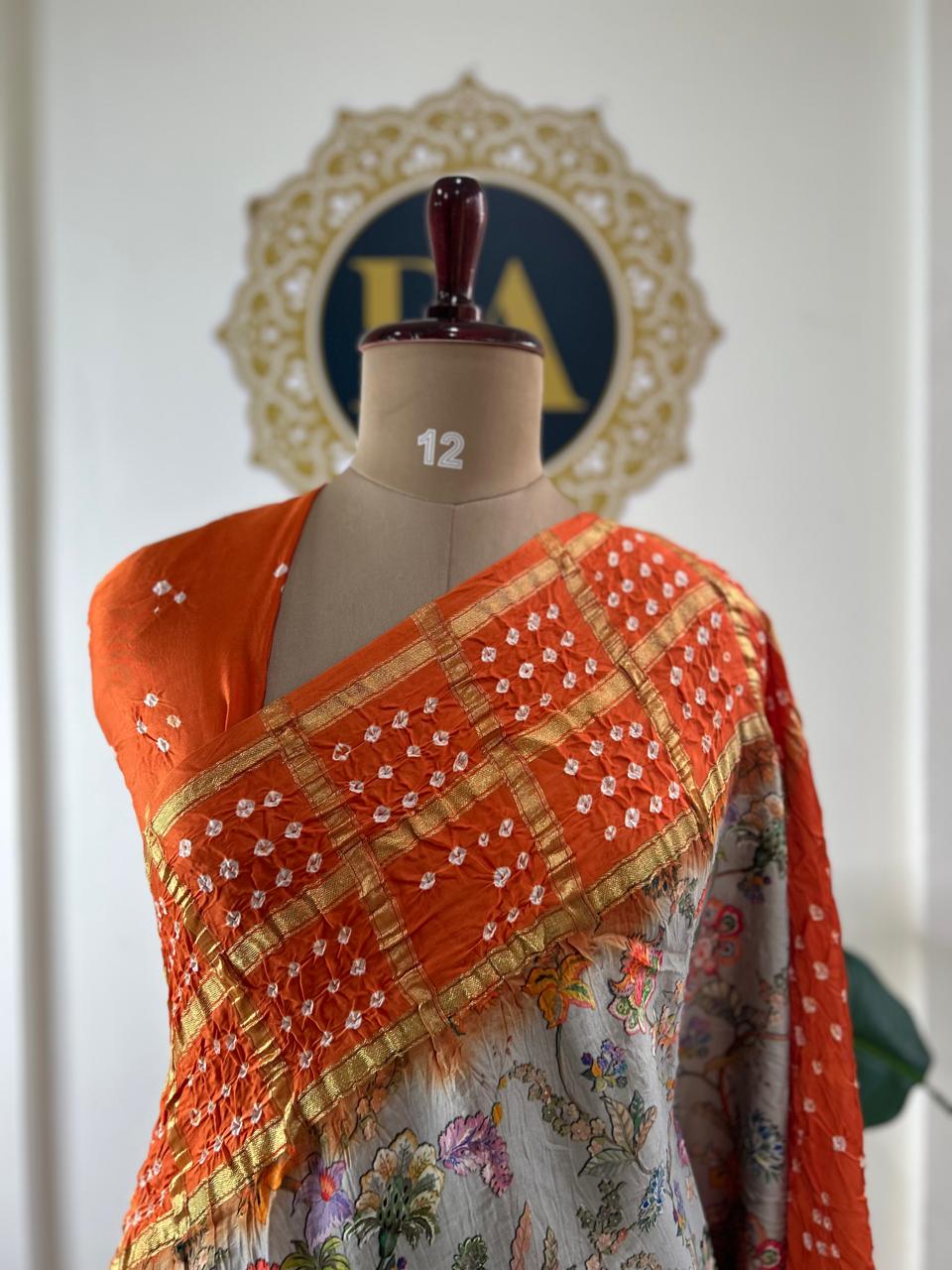 Grey n orange printed pure gajji silk with bandhini blouse saree