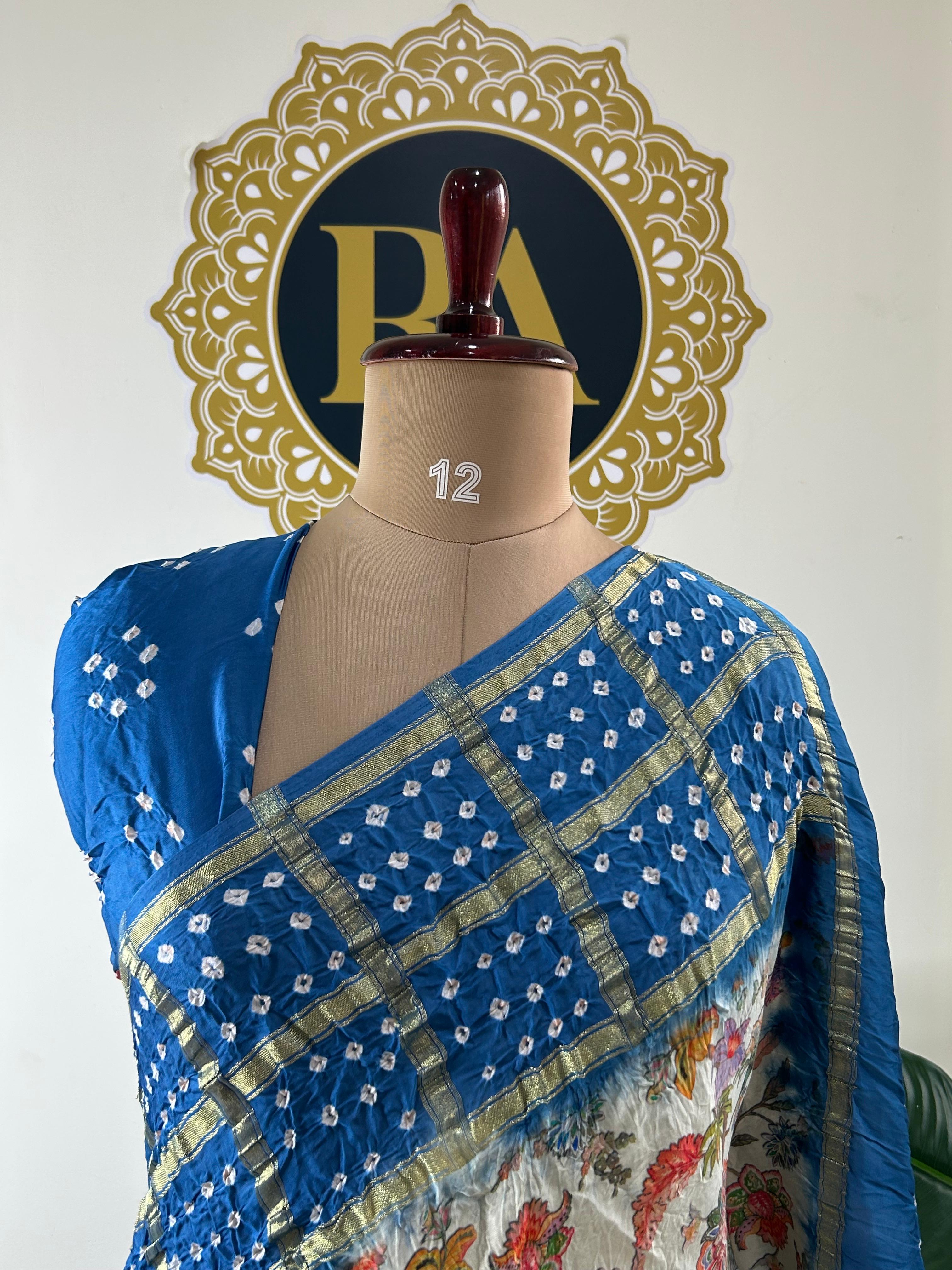 Cream n blue printed pure gajji silk with bandhini blouse saree