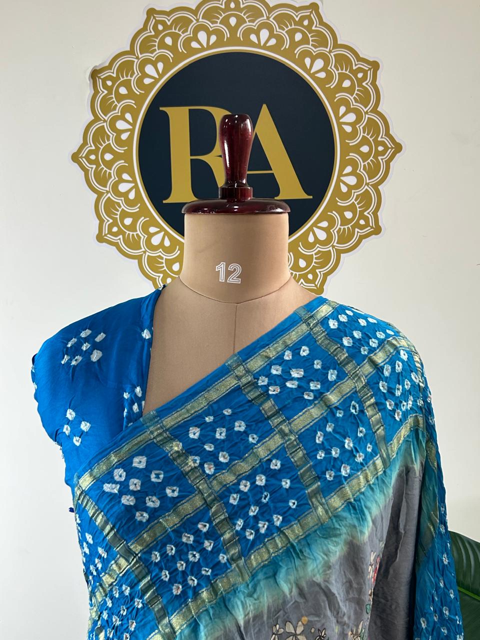 Dark grey n blue printed pure gajji silk with bandhini blouse saree