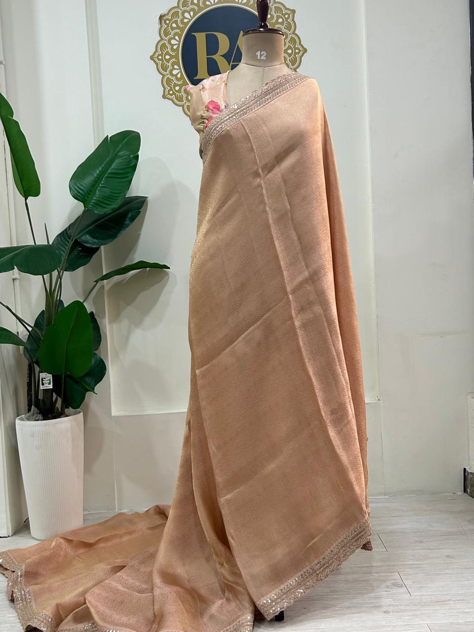 Peach brocade tissue scallop border party wear