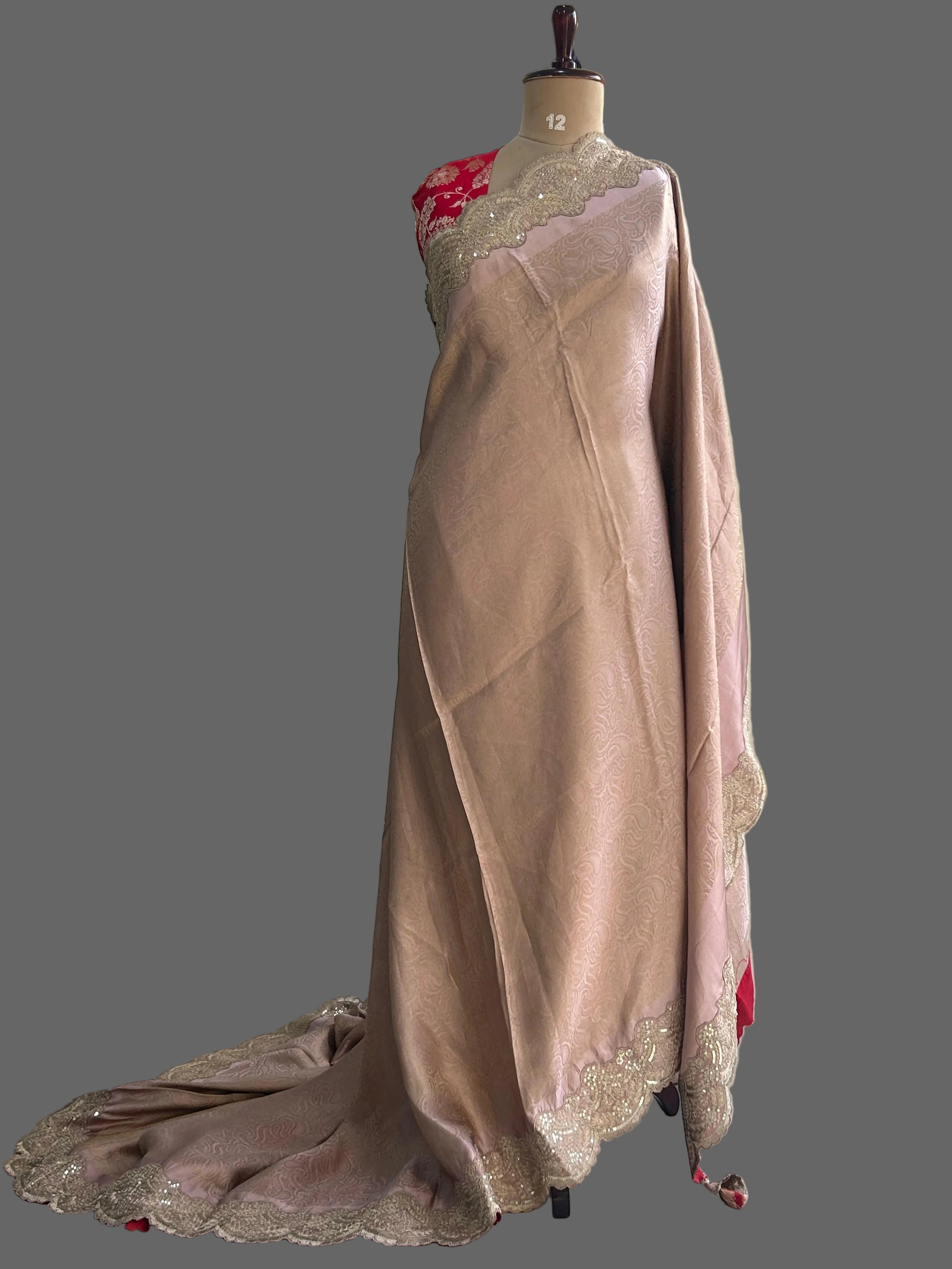 Peach brocade tissue scallop border party wear