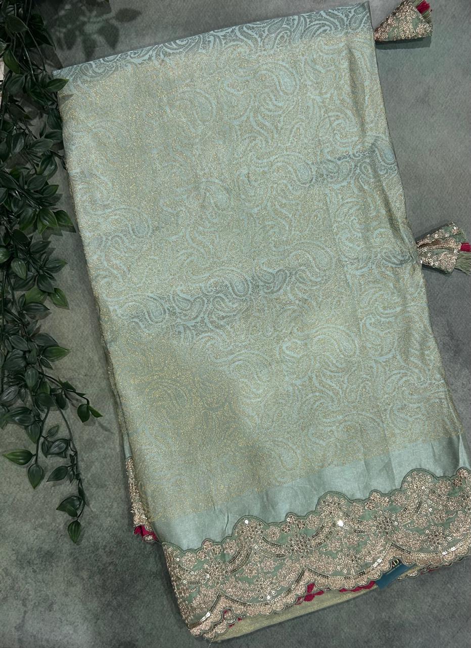 Pastel green brocade tissue scallop border party wear