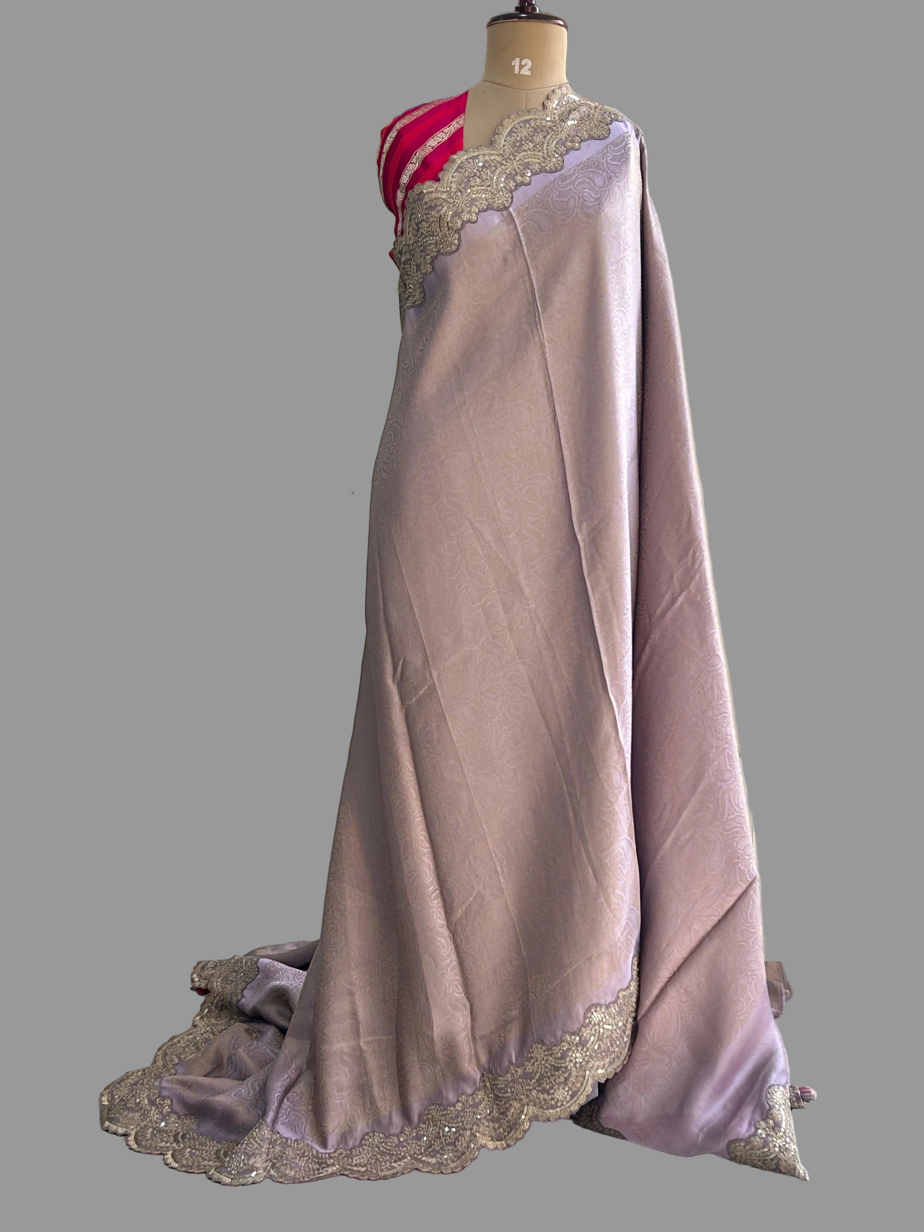 Lavender brocade tissue scallop border party wear