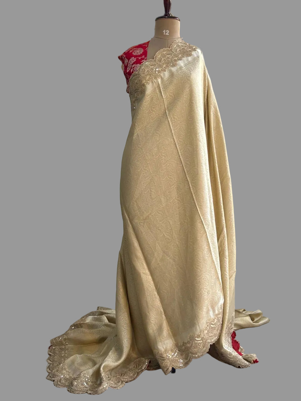 Cream brocade tissue scallop border party wear