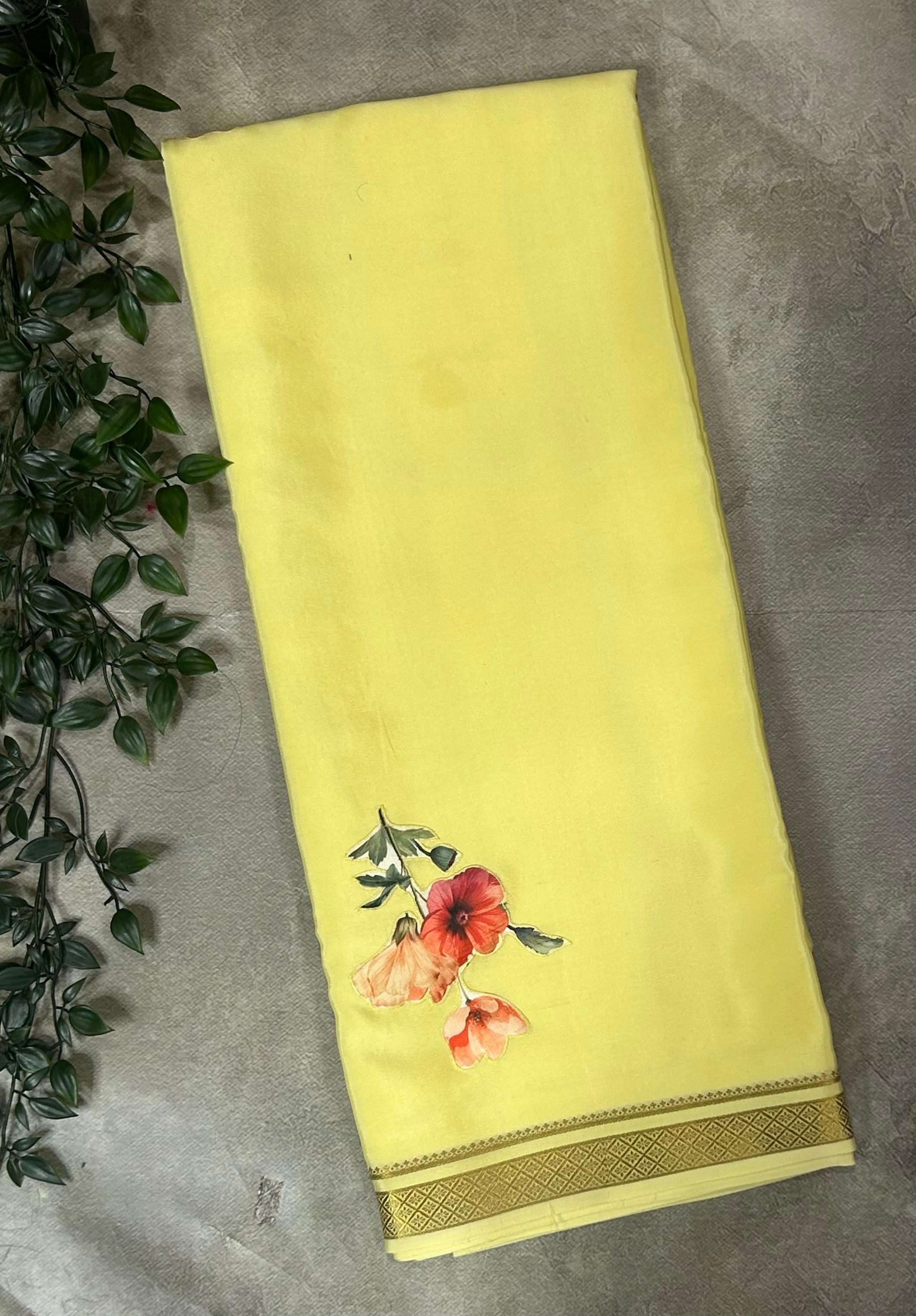 Pastel yellow aplique work pure mysore crepe silk saree