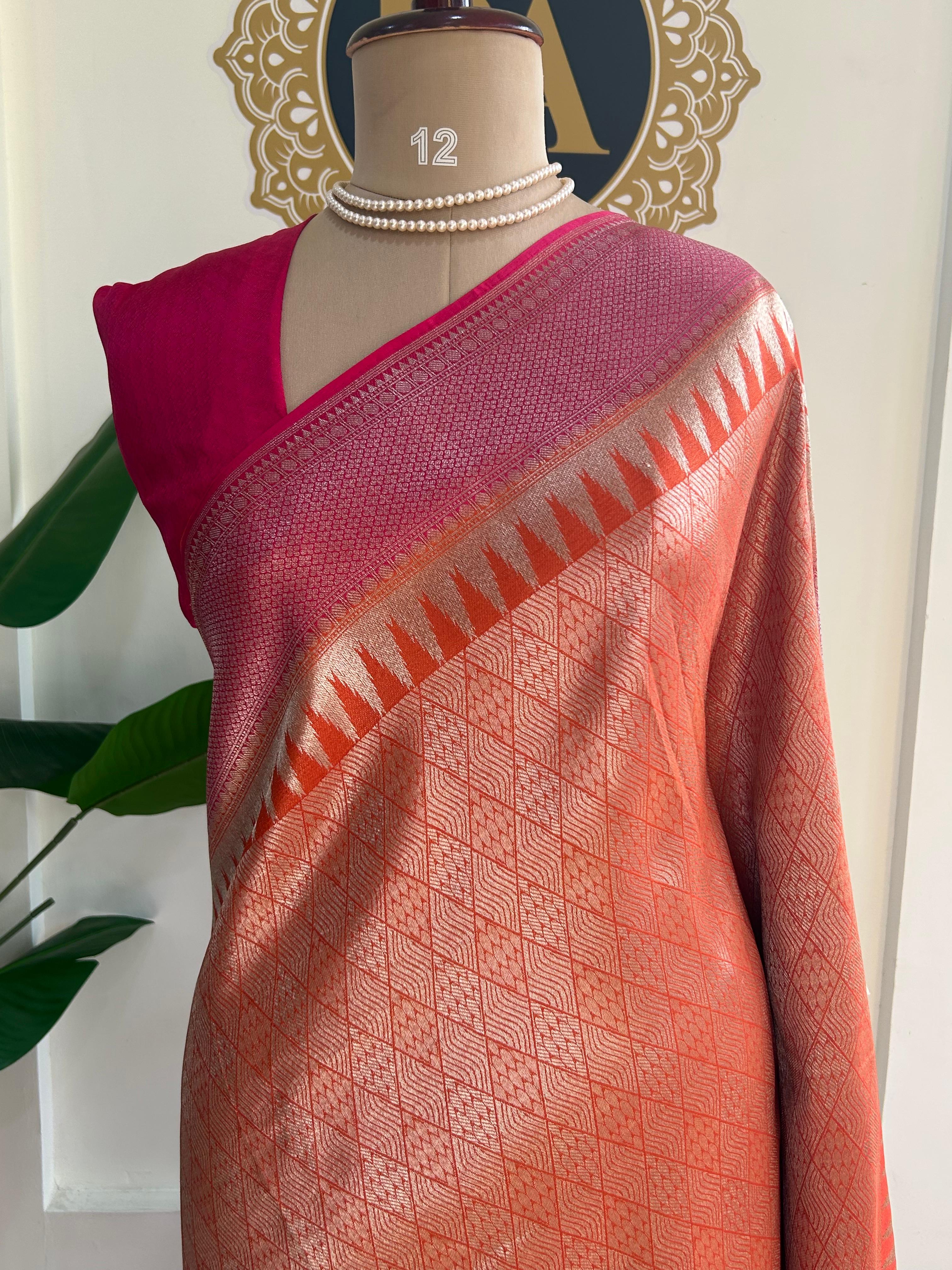 Orange brocade tissue temple border saree