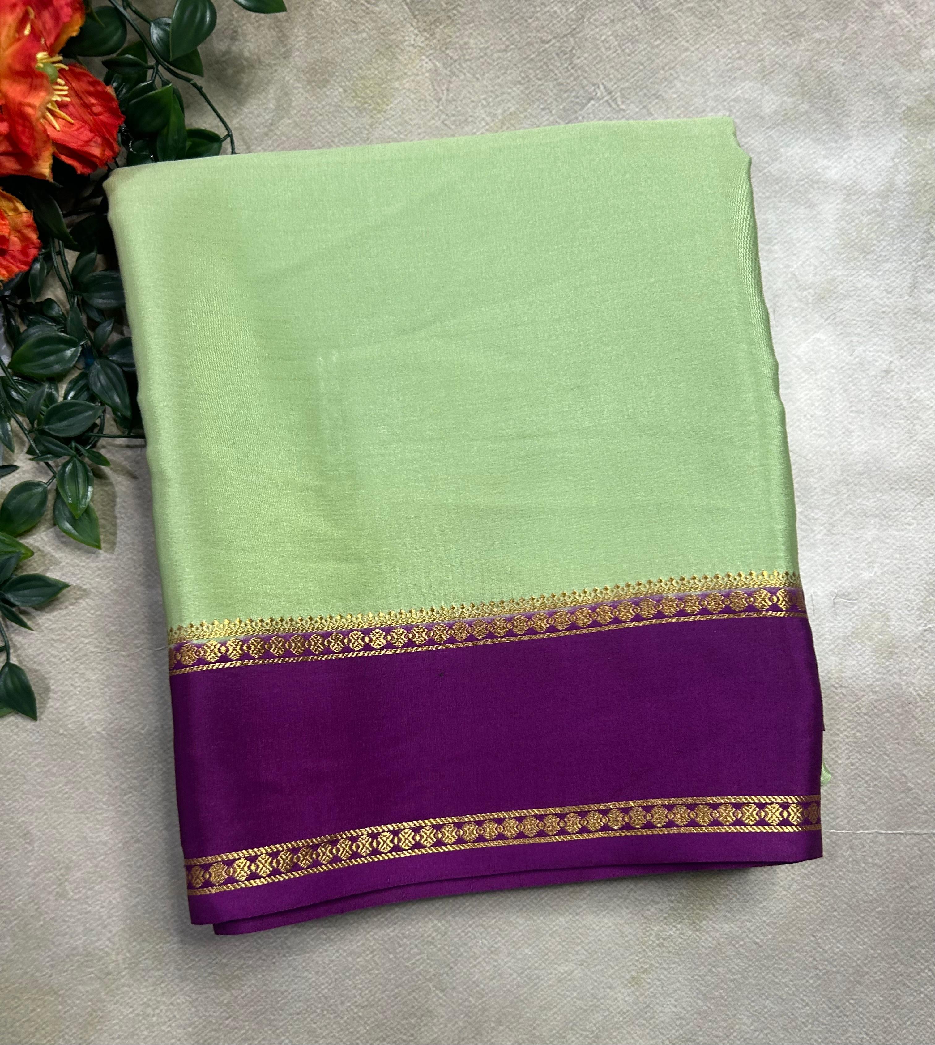 Pastel green n purple plain bentex border pure mysore silk 105 saree