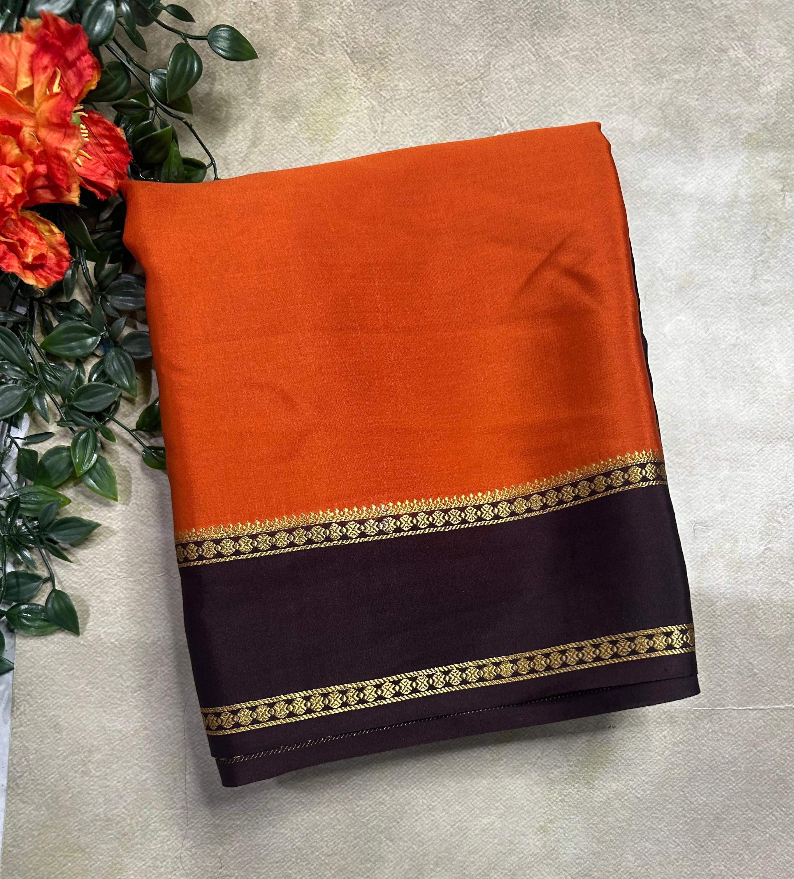 Orange plain bentex border pure mysore silk 105 saree