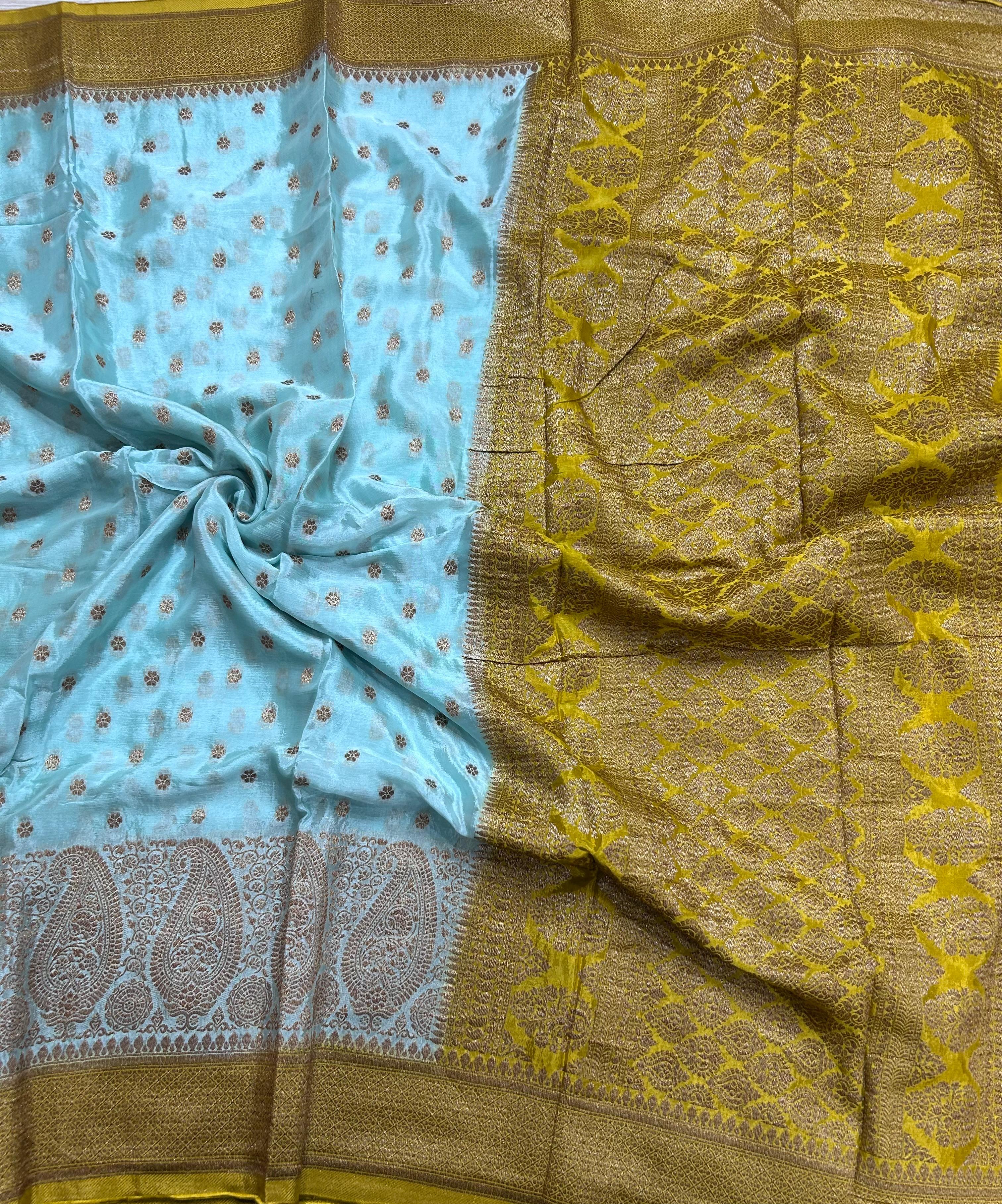 Sky blue contrast small butta chinnon 106 saree