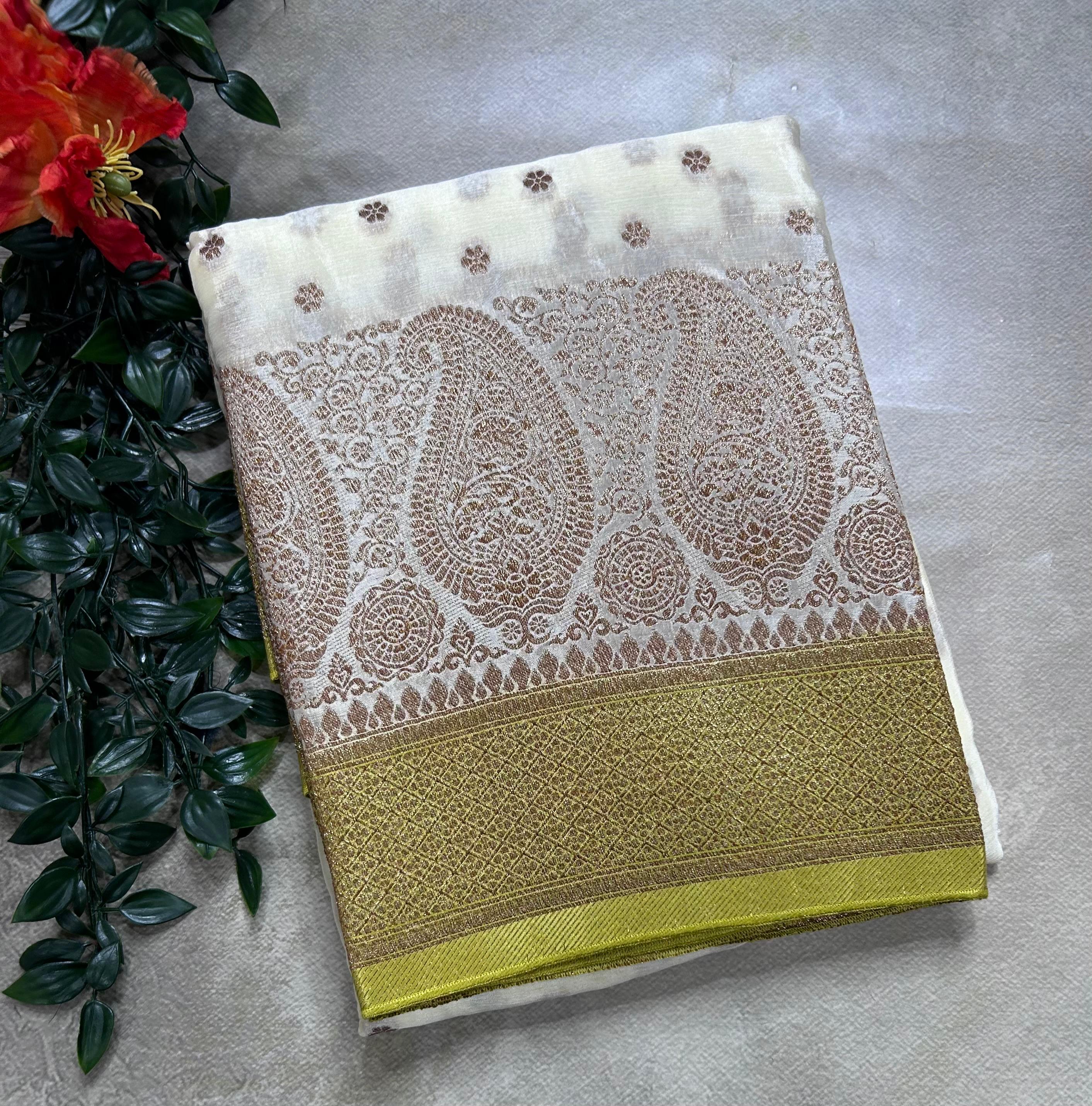Cream contrast small butta chinnon 106 saree