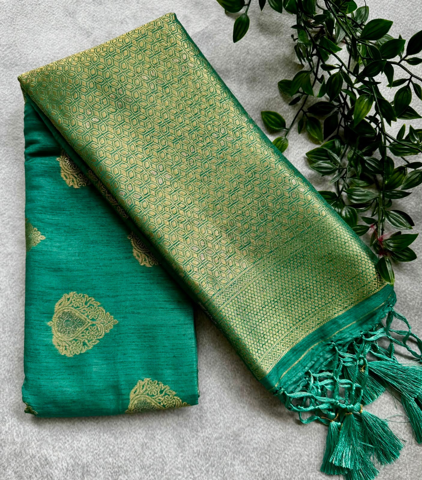 Green semi soft silk saree