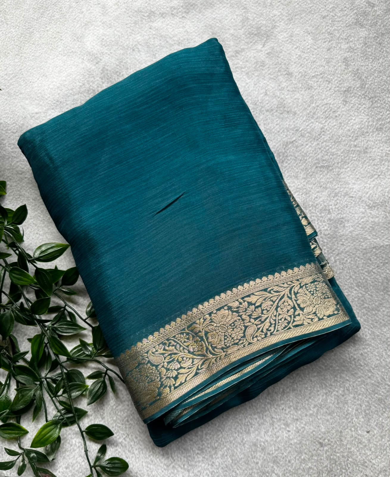 Peacock blue chinnon saree