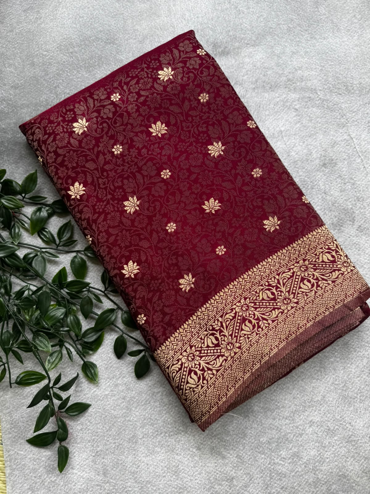 Maroon brocade crepe saree