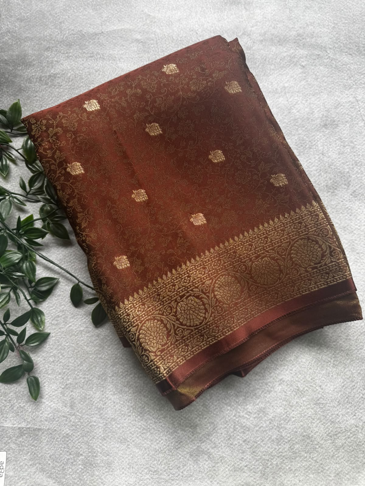 Brown brocade crepe saree