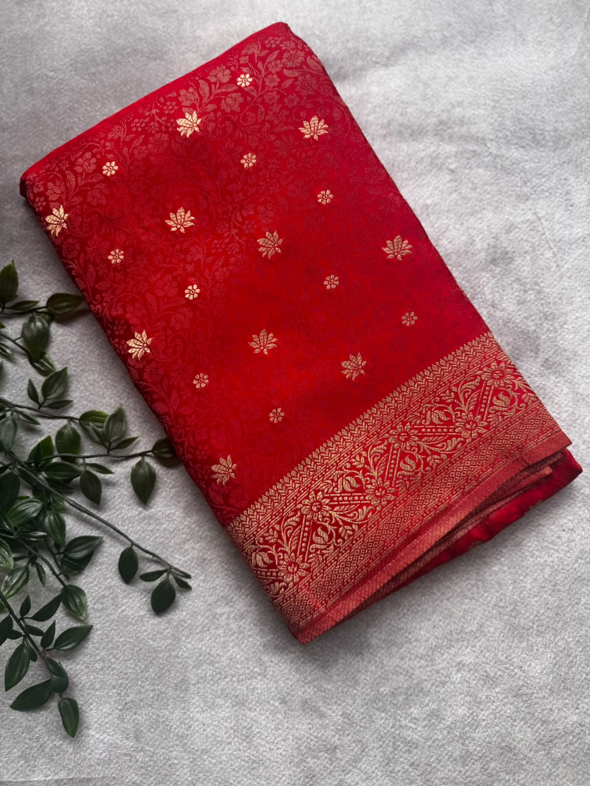 Red brocade crepe saree