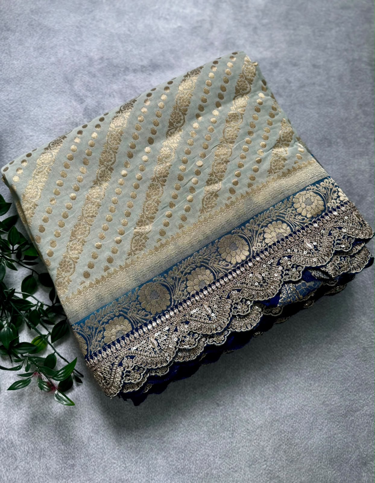 Light blue scallop border georgette saree