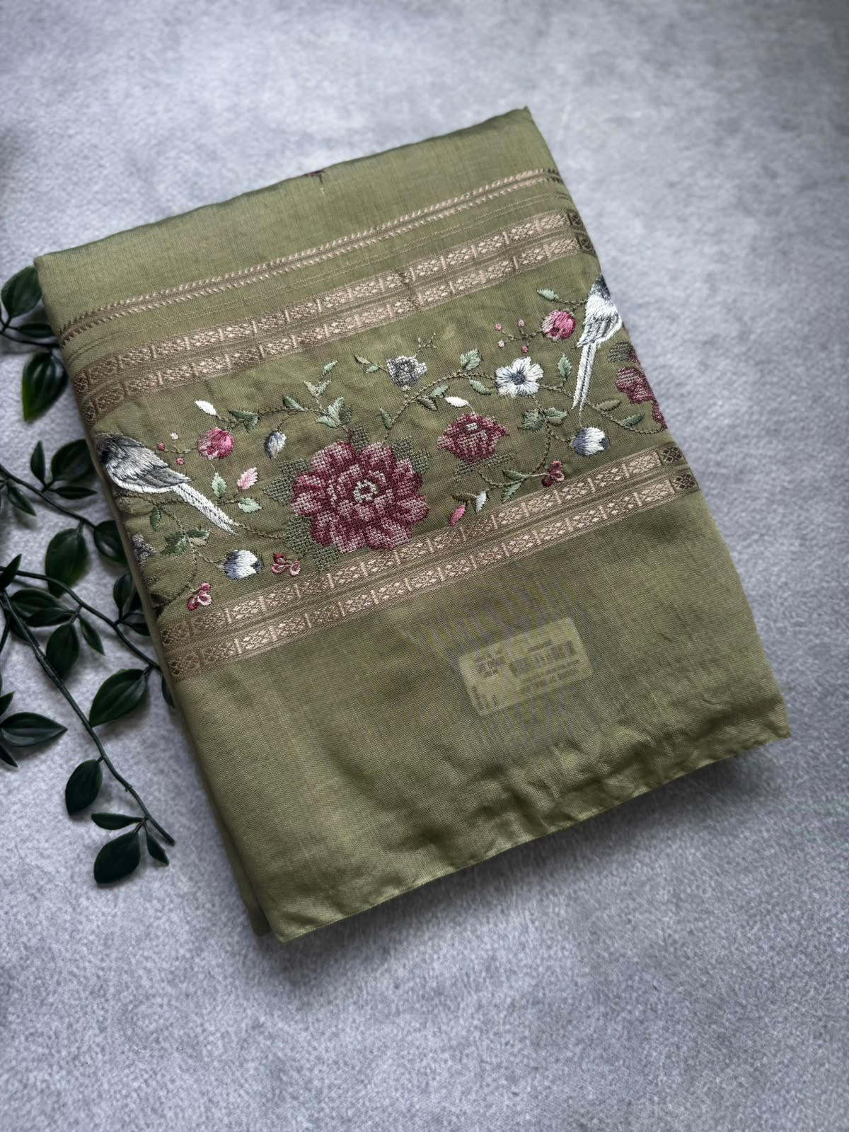 Pastel olive embroidery soft tussar crepe saree