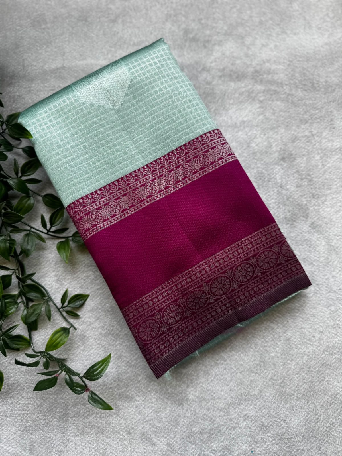 Pastel green checks crepe saree