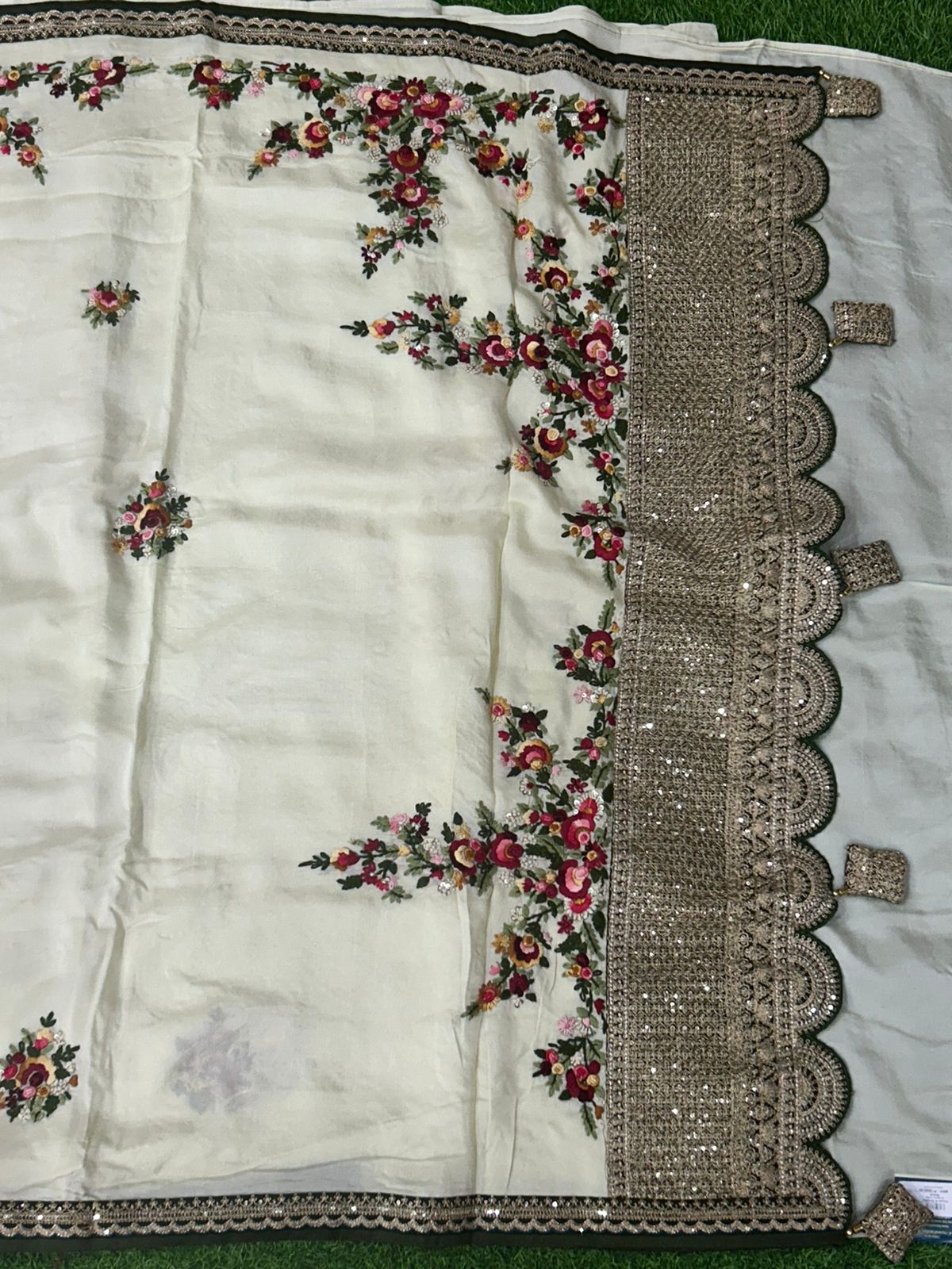 Pastel yellow crepe designer knot work saree