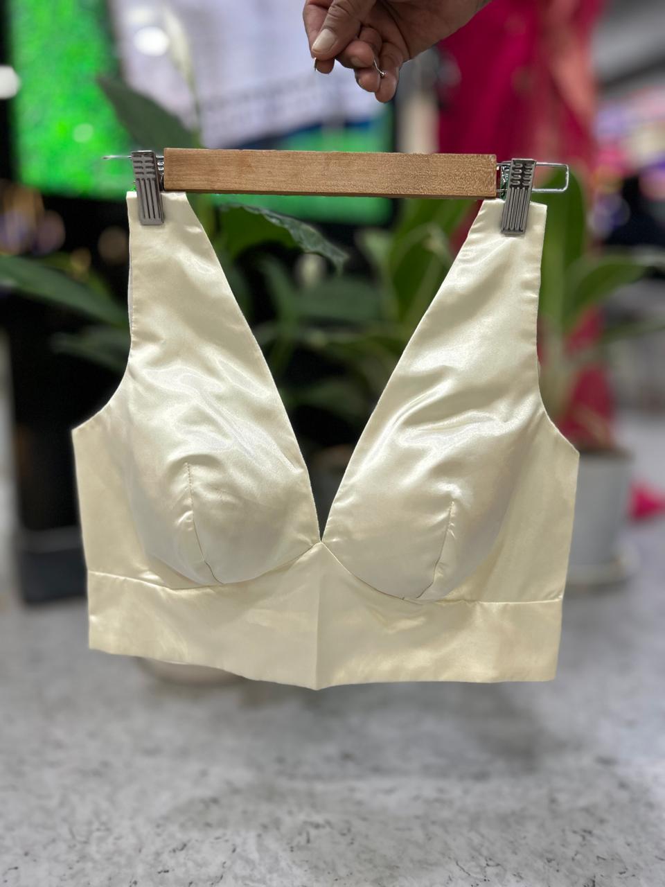 Cream satin plain sleeveless blouse