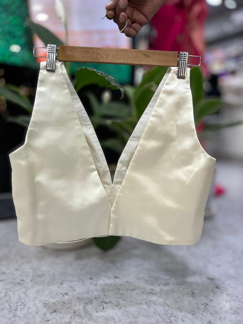 Cream satin plain sleeveless blouse