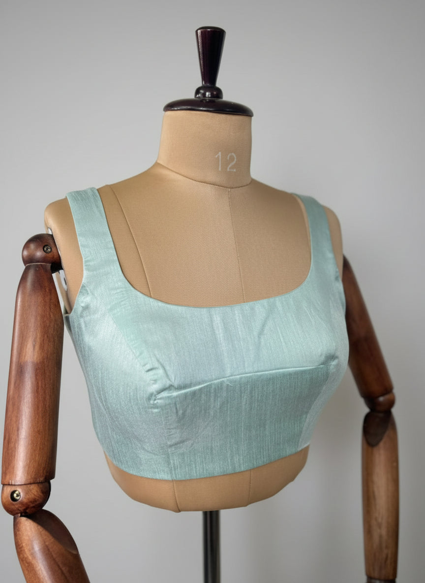 sea green semi raw silk  sleeveless blouse