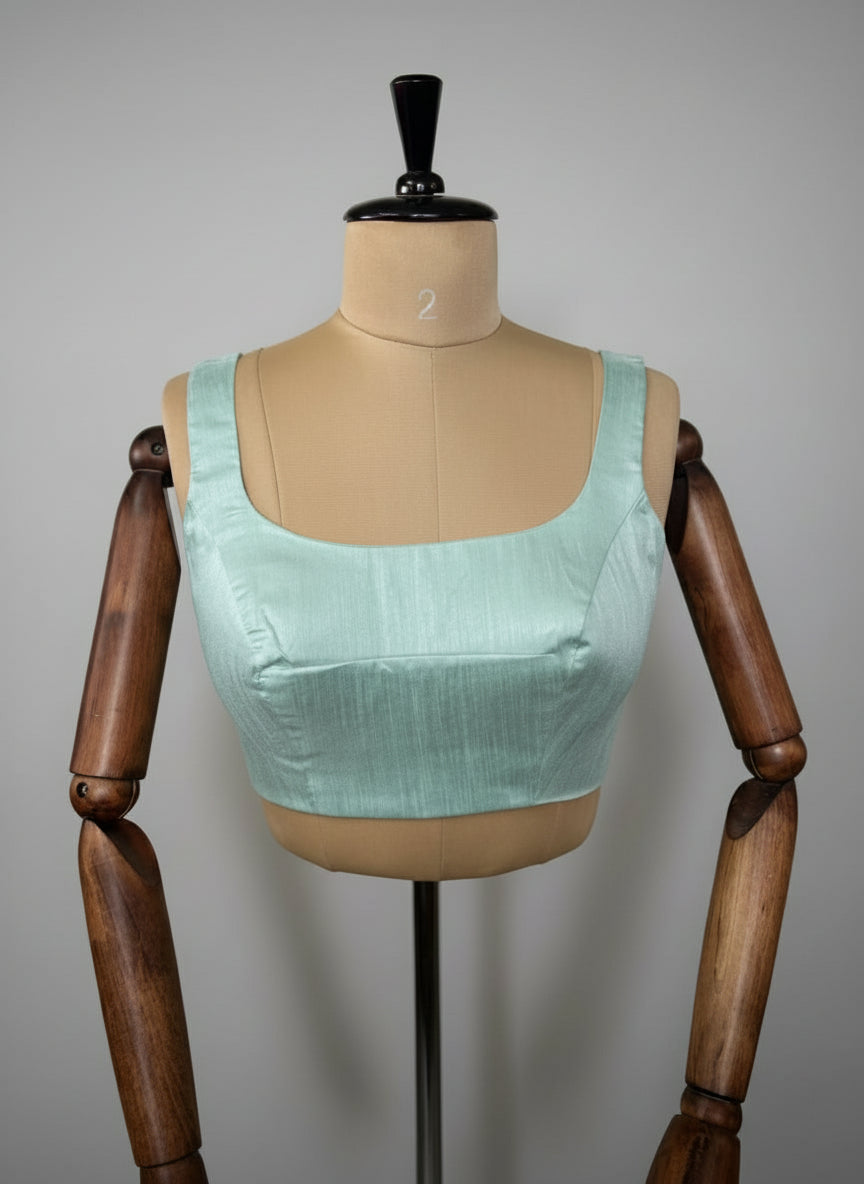 sea green semi raw silk  sleeveless blouse