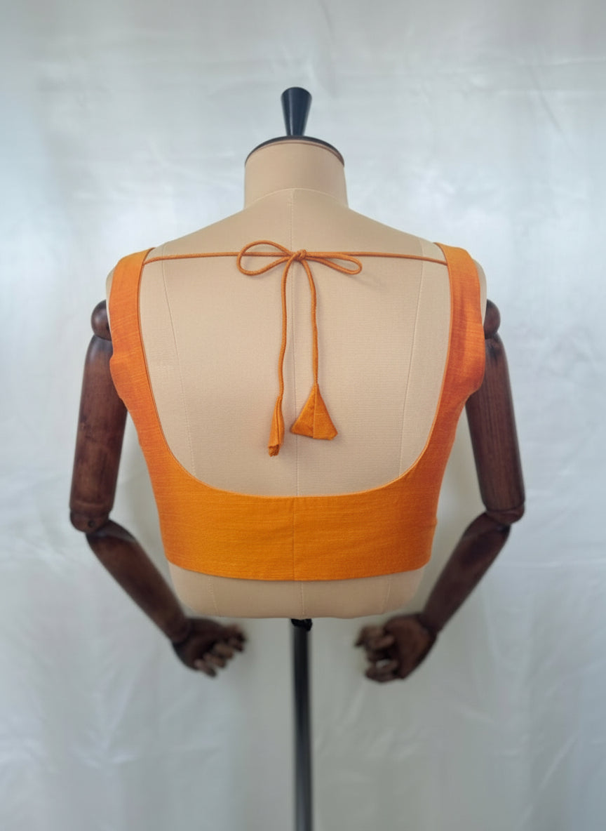 Orange  semi raw silk sleeveless blouse