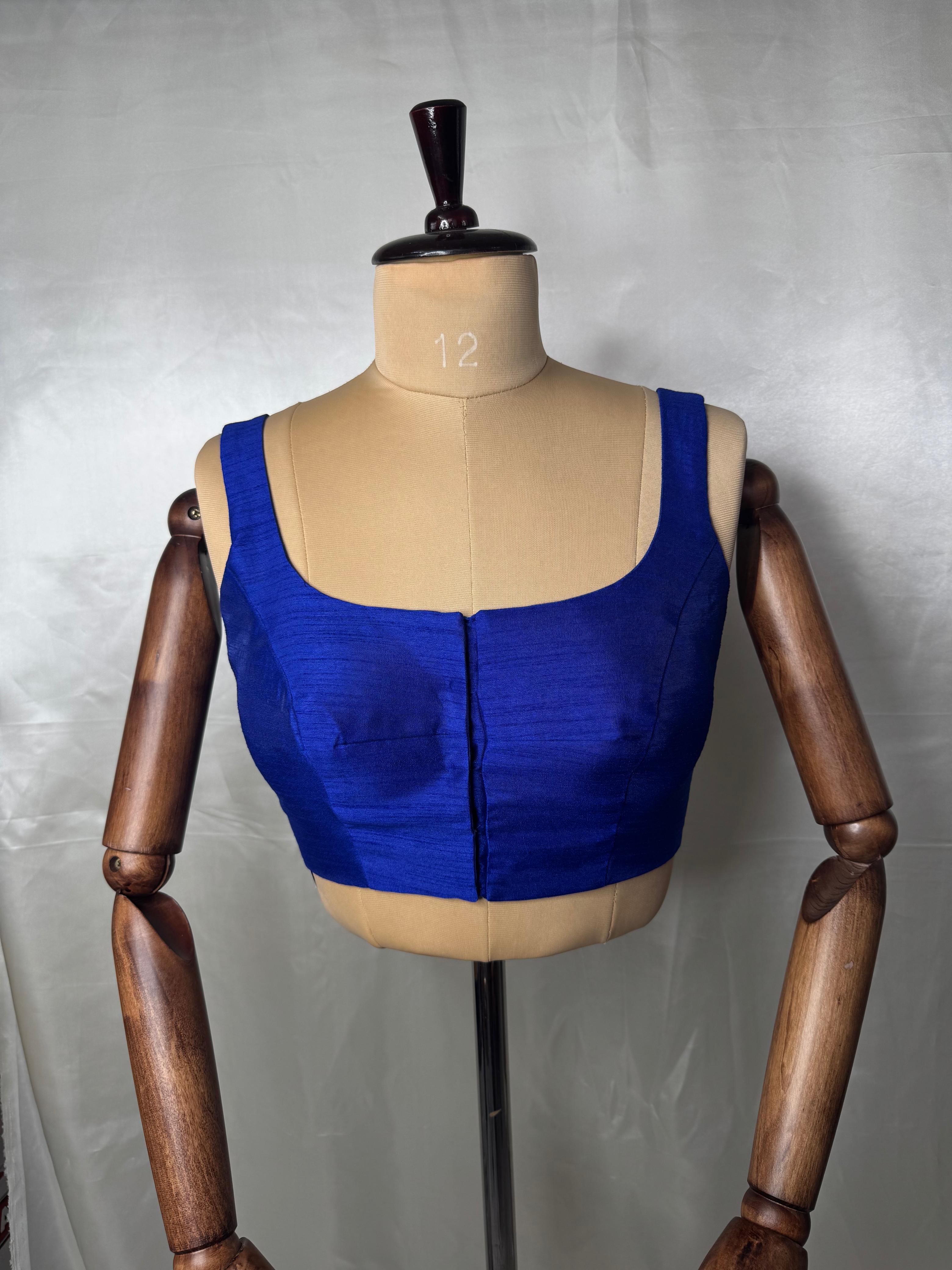 Blue raw silk sleeveless blouse