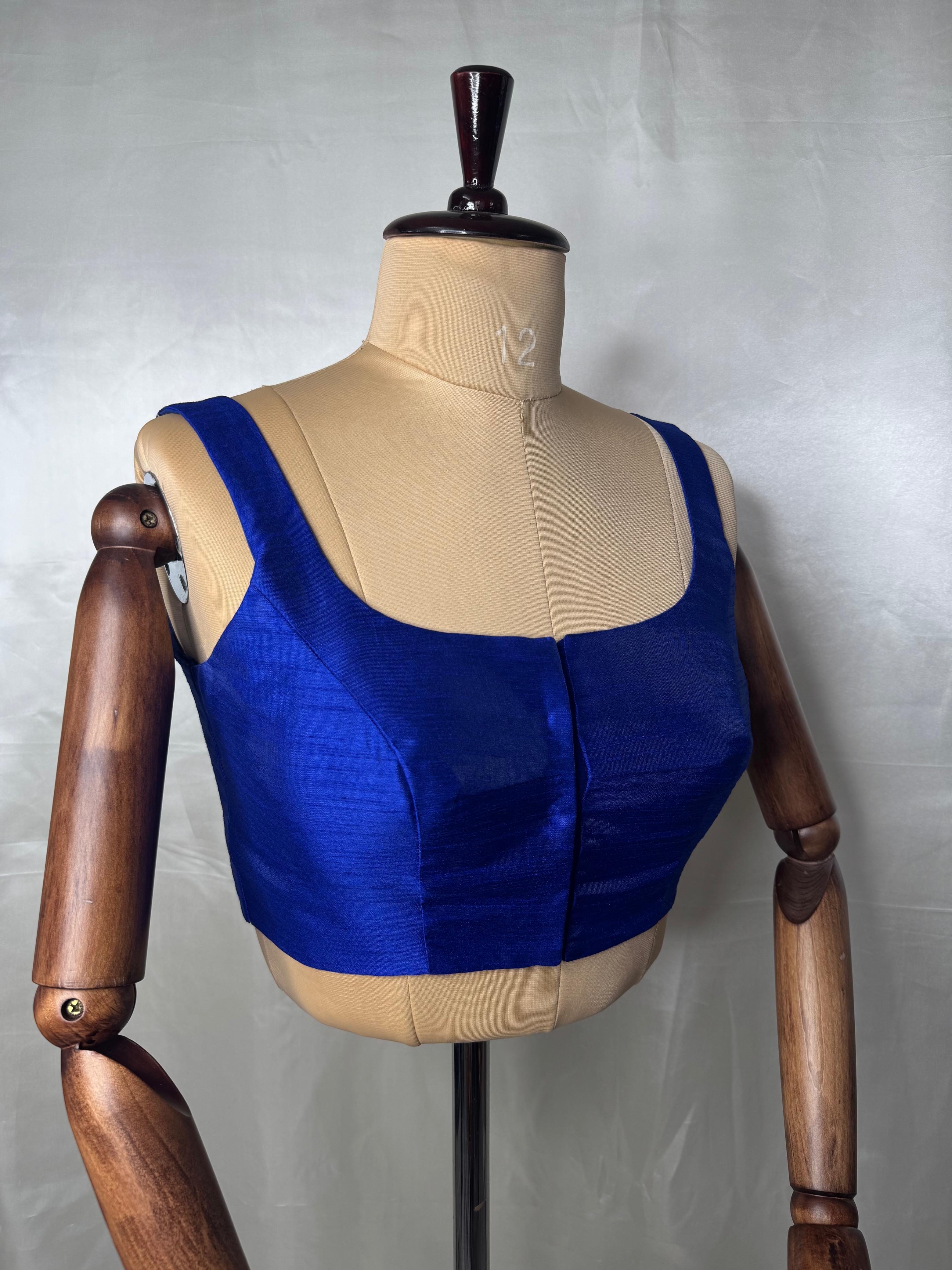 Blue raw silk sleeveless blouse