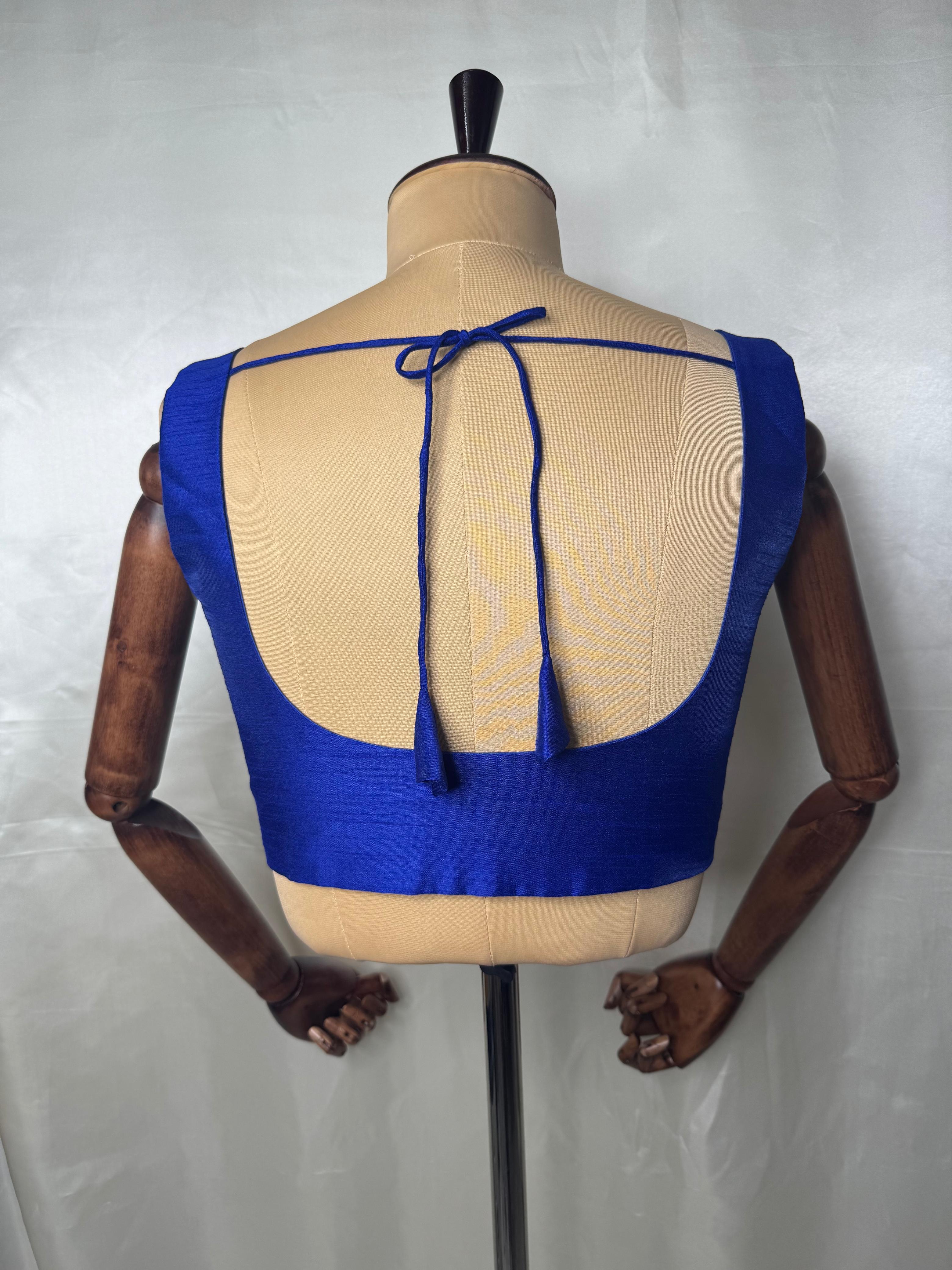 Blue raw silk sleeveless blouse