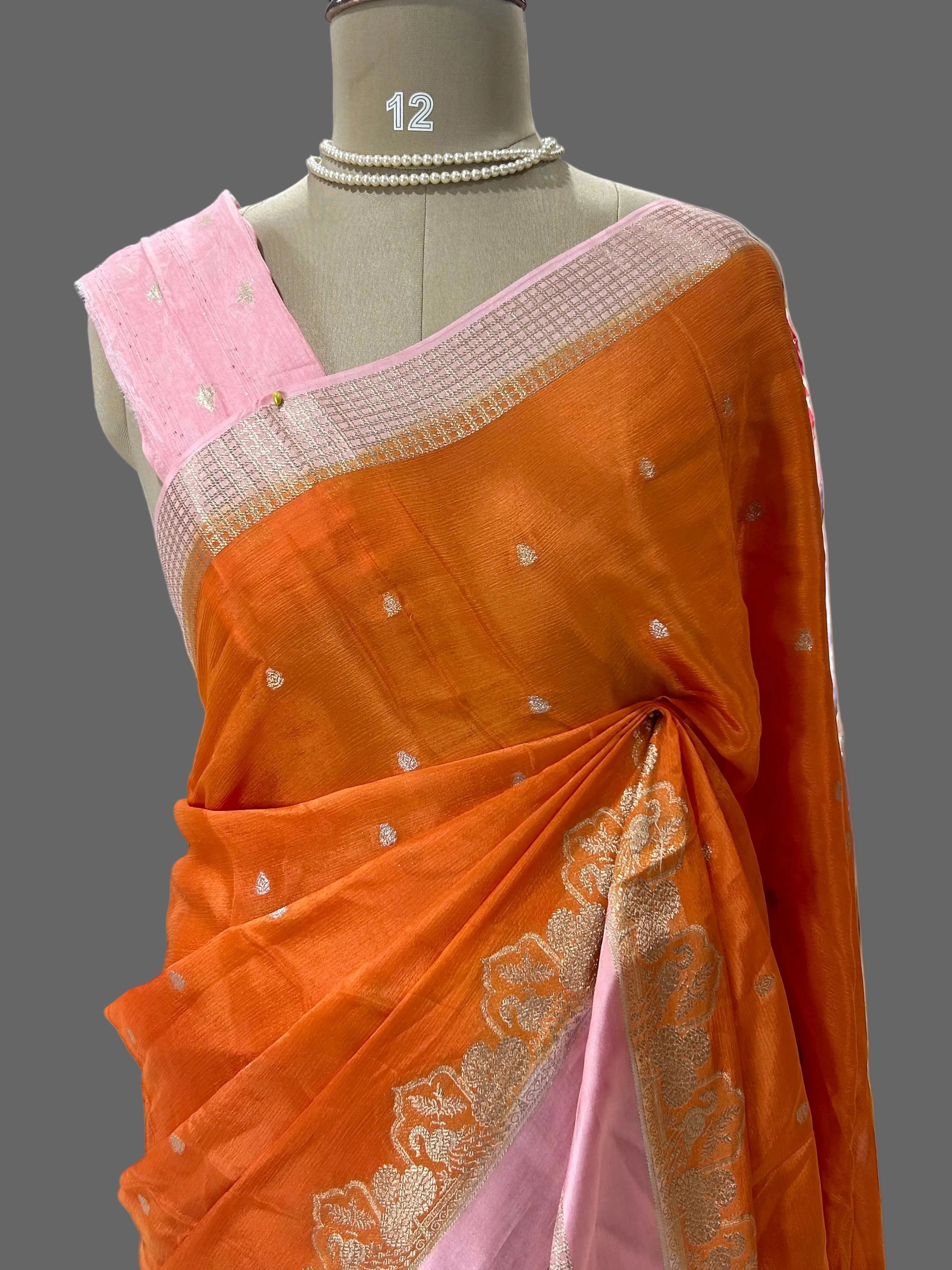 Orange n pink chinnon 102 crepe saree