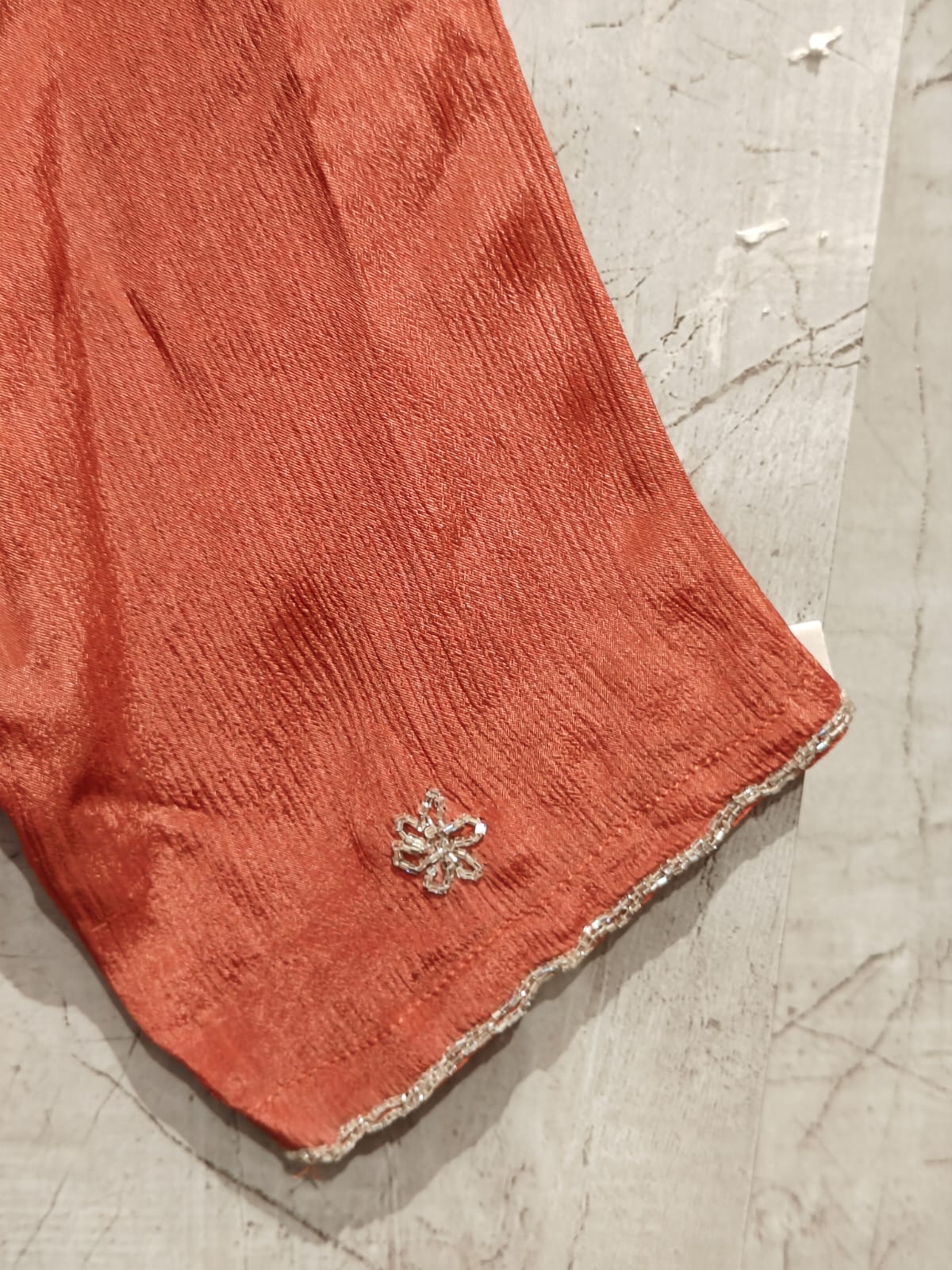 “Pari" Rustic Orange chinnon handwork party ware Kurtha set