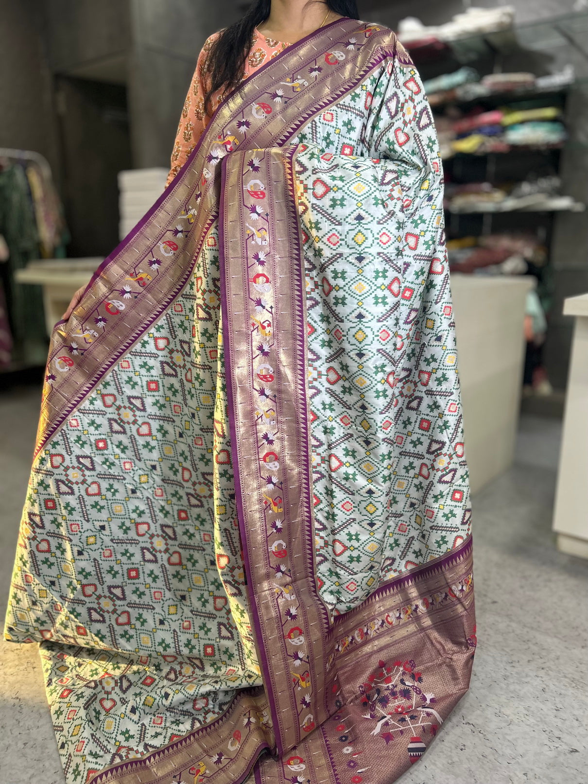 White copper border patola saree