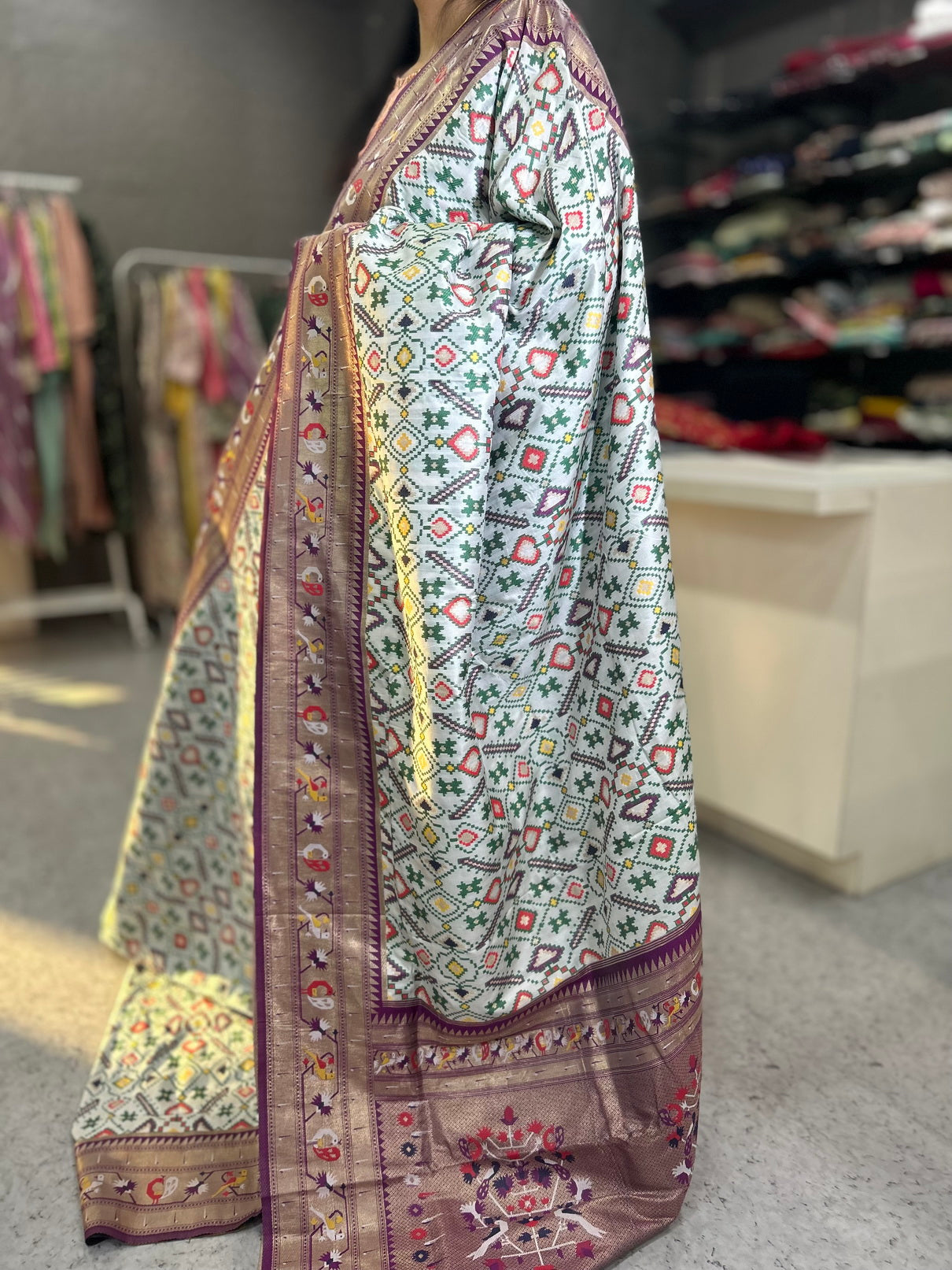 White copper border patola saree