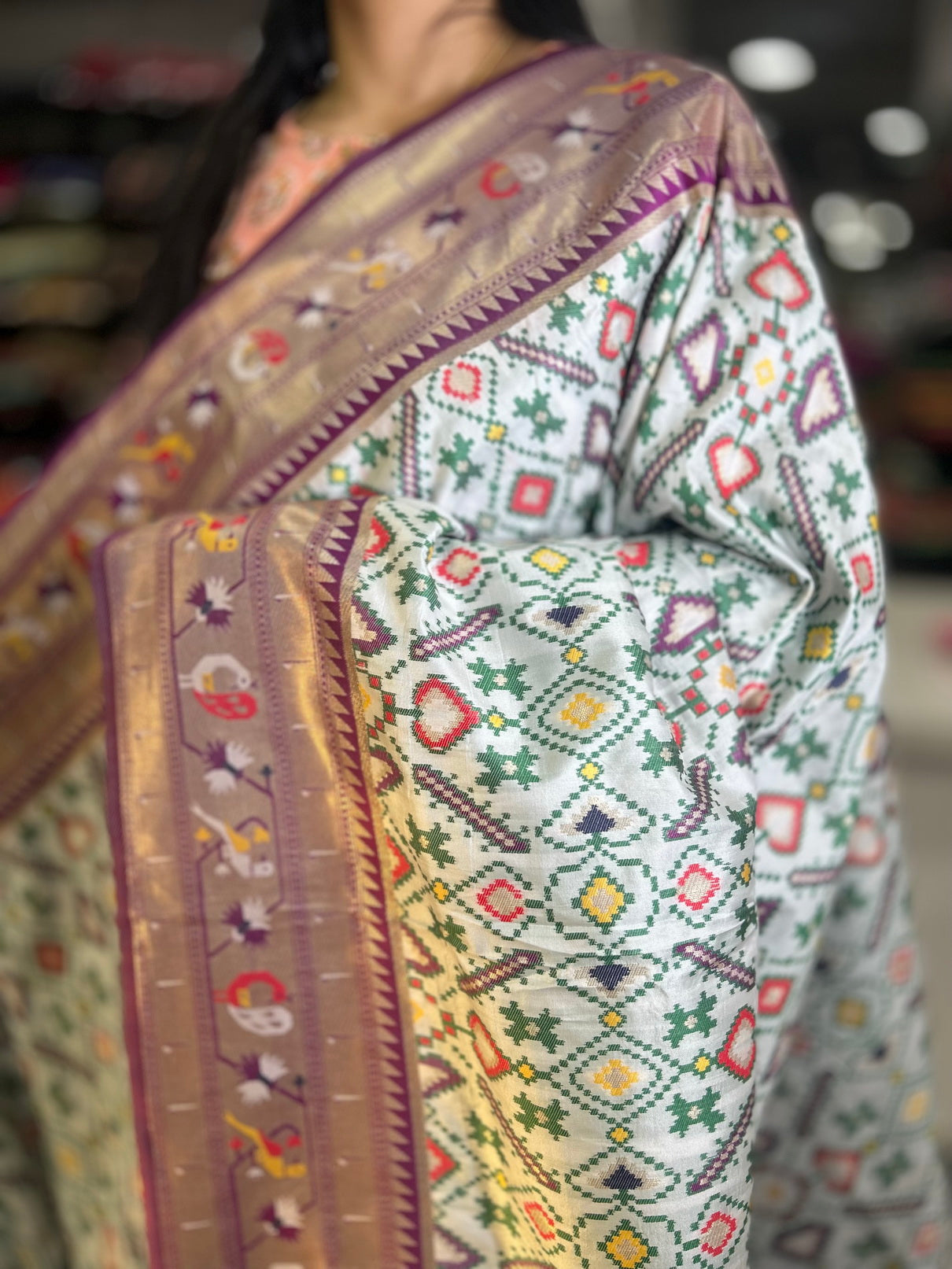 White copper border patola saree